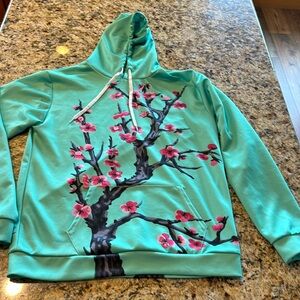 Hoodie size L with cherry blossoms.